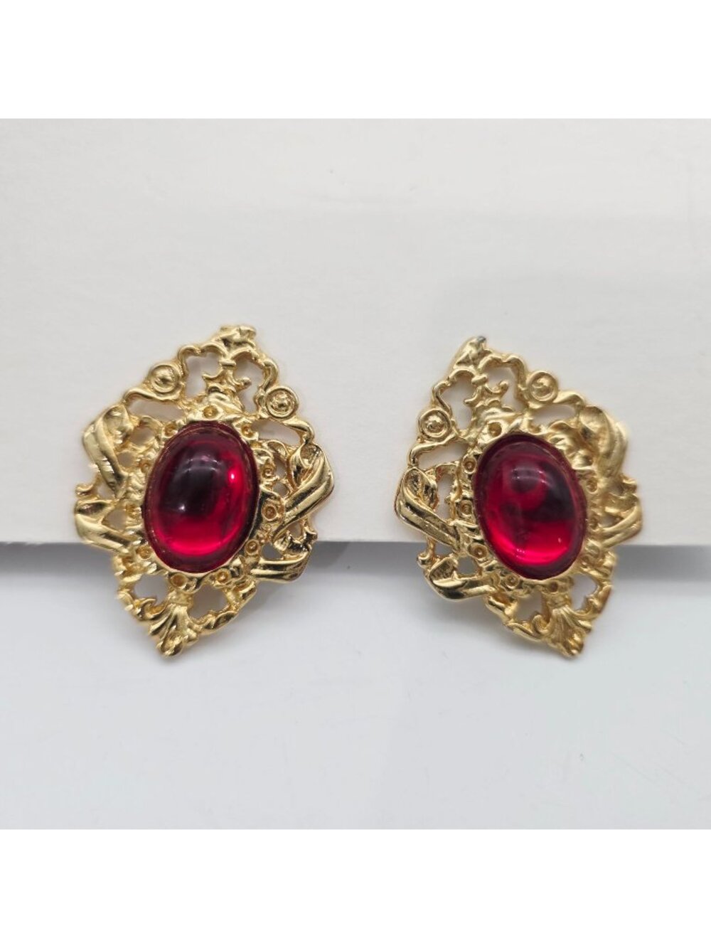 1960s Gold-Tone Clip-On Earrings Red Cabochon Center And Ornate Filigree 1.5"